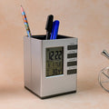 Multifunction digital desk clock showing time, date, and indoor temperature