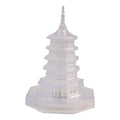 Illuminated crystal pagoda decorative lamp showing warm LED glow
