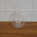 Illuminated LED drink cup with straw for festive occasions