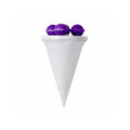 Laundry lint catcher ball positioned in washing machine