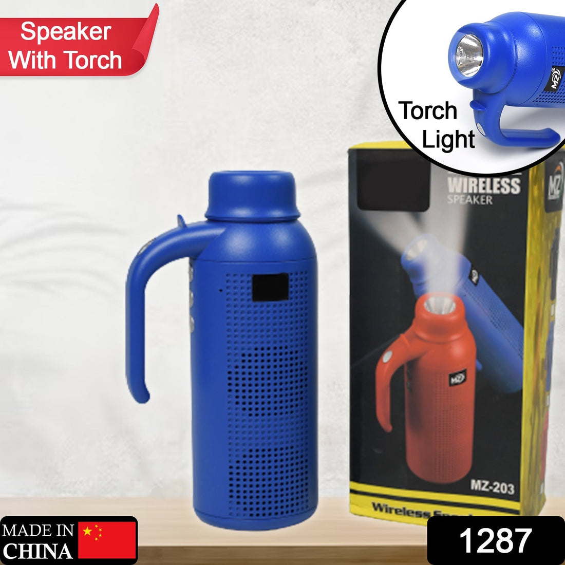 Portable Bluetooth speaker with an integrated LED torch light shown in a dark setting.