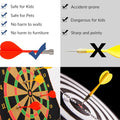 People playing magnetic dartboard game indoors
