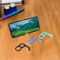 Universal design hand holder phone stand made of durable plastic