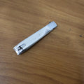 Stainless steel nail cutter in action, cutting nails precisely