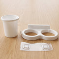 Durable plastic toothbrush holder for wall mounting in bathrooms