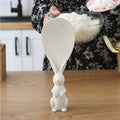 Side view of rice spoon with cute bunny handle design