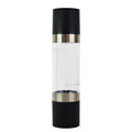Clear acrylic chamber displaying salt and peppercorns inside grinder
