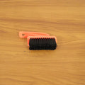 Shoe cleaning brush in live use cleaning sneakers and household surfaces