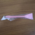 Close-up image of silicone facial mask applicator tool