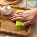 Freshly peeled garlic cloves after using silicone garlic peeler tube