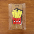 Travel luggage identifier tag with playful fries graphic