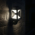 Outdoor solar LED lamp mounted on pole providing energy-efficient lighting