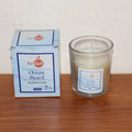 Votive candle with a calming Ocean Beach fragrance, perfect for relaxation.