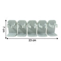 Wall mounted kitchen rack holding assorted spice jars
