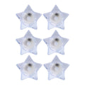 Battery operated LED candles in star-shaped holders for safe lighting