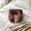 Portable U shaped pillow with soft brown cover