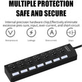 Black 7 Port USB Hub connected to a laptop, expanding peripheral options.
