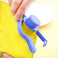 Multiple food bag clips in various colours on kitchen counter.