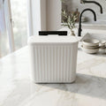 Side view of small kitchen waste bin