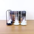 Big wind light style flameless LED candle set glowing softly in home décor setting