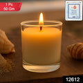 Lit votive candle with a warm, steady flame, creating a serene ambiance.