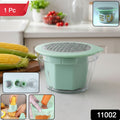 Handheld manual vegetable grater stripping corn kernels efficiently