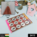 Versatile 12-piece steel self-adhesive hooks for kitchen and bathroom.