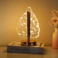 Golden crystal leaf LED lamp front view showing metallic base and crystal shade