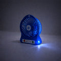 Lightweight portable mini table fan suitable for travel and outdoor use