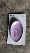 Top-down view of the compact plastic soap dish, highlighting its clean lines and functionality.