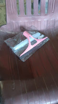 Close-up of the efficient cleaning brush head with integrated squeegee blade.