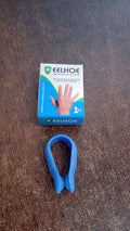 Lifestyle image of a person using the Acupressure Clip for natural pain relief while working.