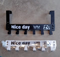 Heavy-duty 6-hook over door hook rack with panda design shown in its packaging.