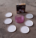 Plastic coasters effectively safeguarding furniture from hot beverage marks and spills.