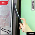 Close-up of corner cleaning brush showing durable stiff bristles and ergonomic handle