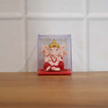 Back view of small red and gold Ganesha decorative statue