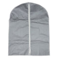 Hanging garment covers protecting clothes inside a closet