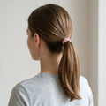 Neutral coloured elastic hair bands with a secure grip, perfect for everyday styling.