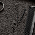 Set of 24 large black hair bobby pins ideal for hairstyling and sectioning