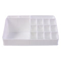 Pull-out drawer of the clear makeup organiser holding compacts and small items.