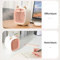Small portable air cooler fan in use on desk
