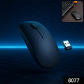 User demonstrating the portable Wireless Mouse on a laptop, highlighting its compact size.