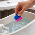 Automatic toilet cleaning block providing freshness with every flush.